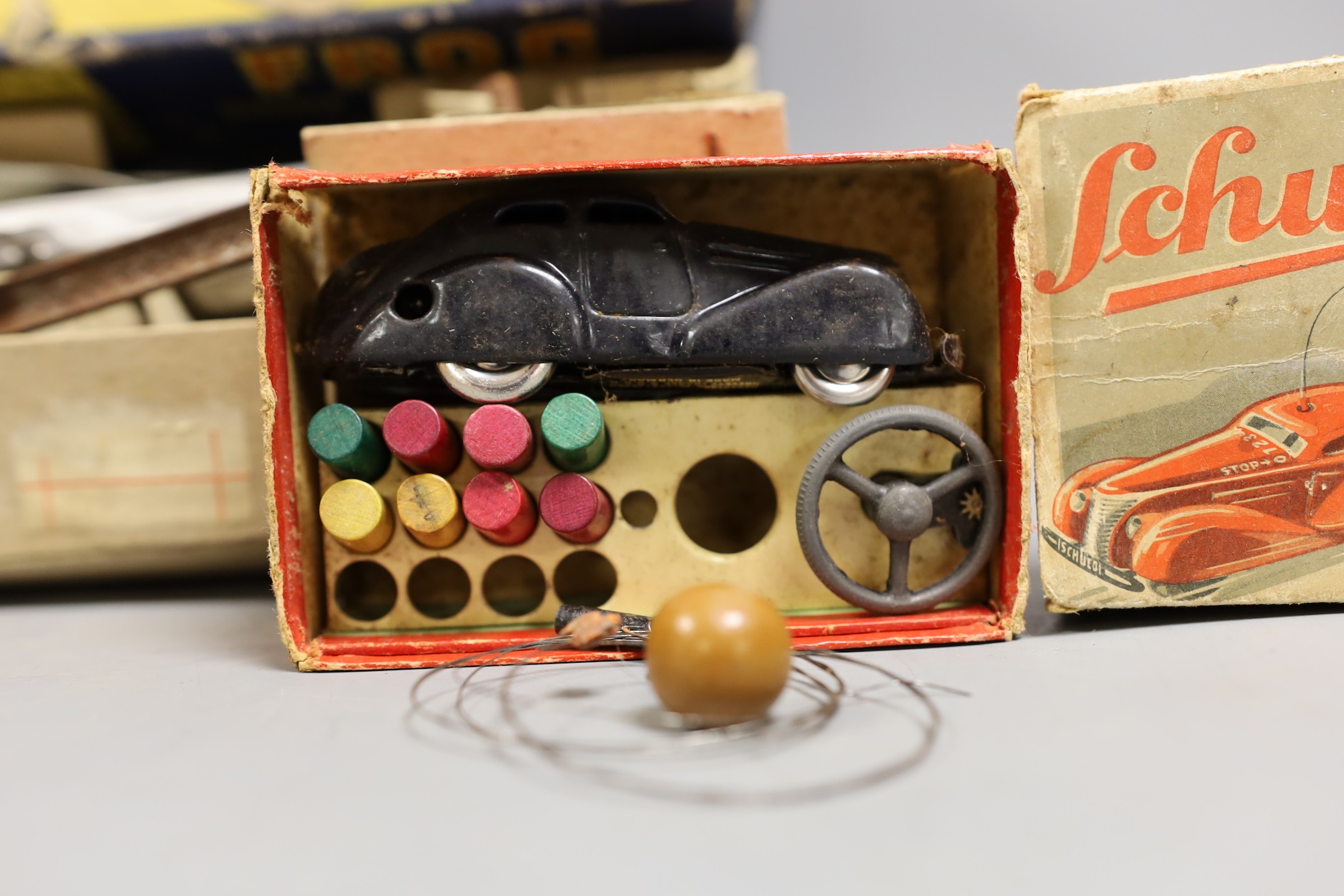 A pre-war Schuco Telesteering Car, and a FROG single-seat fighter aircraft, both boxed